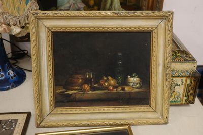 a picture of a painting on a table with a mirror in the background