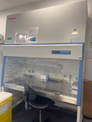 a lab with a desk and a chair in it