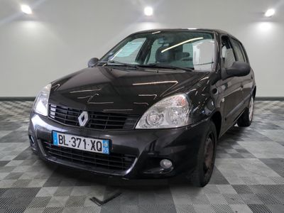 a picture of a black car parked in a garage