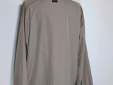 the back of a light brown jacket on a mannequin mannequin