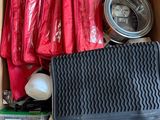 a cardboard box filled with assorted items on a table