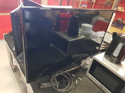 a television that is sitting on top of a table