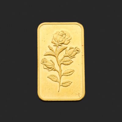 une image représentant un lingot d'or orné d'une rose