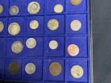 a display case with a lot of coins in it