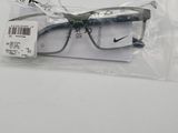 a pair of glasses in a plastic bag on a table