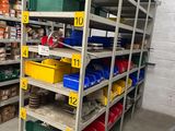 many shelves with various items on them in a warehouse