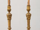 pair of antique brass candlesticks on marble bases