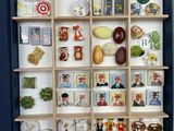 a shadow box with many different items in it