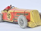 a red and yellow toy car with a number 52 on it