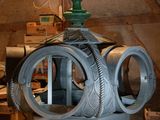 an image of an old fashioned stove in a barn