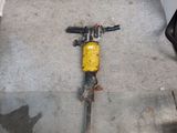 a yellow and black motorcycle that is laying on the floor