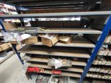 many shelves with boxes and boxes on them in a store