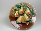 a plate with a bunch of pears on it