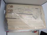 a box with a lot of stamps on it on a table