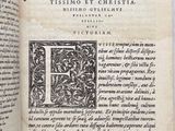 an open book with a black and white design on it