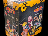 a box of action figures on display on a black background