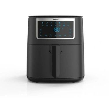 une image d'une friteuse à air chaud sur laquelle figure une horloge numérique