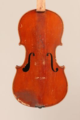 a close up of a violin on a white background