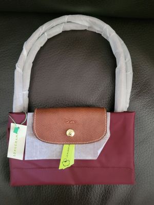 longchamp purse in burgundy and tan