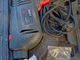 a black box with tools in it sitting on the ground