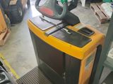 a forklift with a steering on it in a warehouse