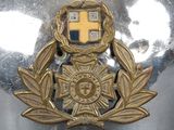 a badge on the back of a silver motorcycle