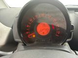a close up of a car dashboard with a speedometer