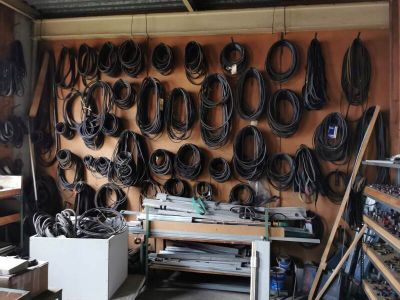 a garage with a lot of tools hanging on the wall