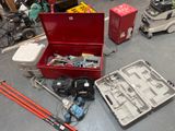 a lot of tools that are laying out on the floor