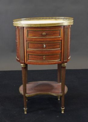 a small wooden table with two drawers and a shelf on top