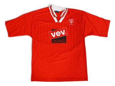 the shirt is red and white with a black and red logo on it