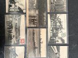 several black and white photographs of a train on a black surface