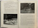 an open book with pictures of people in the water