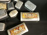 many different types of lighters sitting on a table