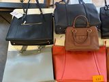 a lot of purses that are on a table