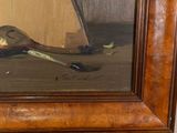 a picture of a painting on a easel with a bird on it