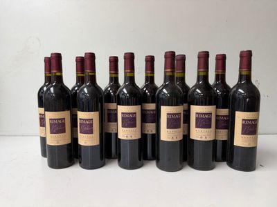 six bottles of wine are lined up on a table