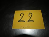 a close up of a yellow sign with the number 22 on it