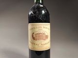 a bottle of wine that is sitting on a table