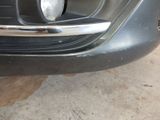 a close up of the front bumper of a car