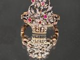 une image représentant une bague sertie de diamants et de rubis