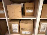 many boxes on the shelves in the room