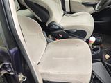 a picture of a car with a dirty seat and dashboard
