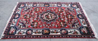 rug on the floor with a red background and a black background