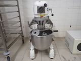 an image of a kitchen with a mixer and a microwave