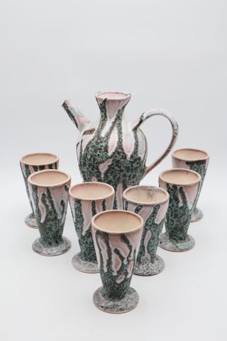 POTERIE DU BREUIL -Service à orangeade en faïence à décor granité...