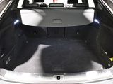 the back of a car with the trunk open and the seats down