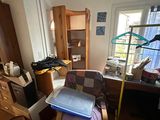 a room with a lot of clutter in it