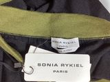 an image of a black and green jacket with a name tag on it