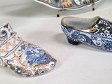 many different types of clogs on display on a table